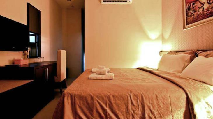 Hotel Marina Ambon Quarto foto